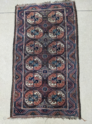 Attractive antique Mahdad Khani Baluch with a lot of blue greens. 3'4" x 5'10" or 102 x 178cm. Some oxidized brown otherwise good pile.

Cheers.         