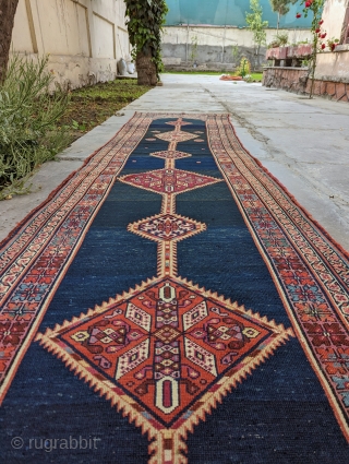 Antique, skinny Kurdish runner. It has a great deep blue field.

2'9" x 13'5" or 84 x 409cm

Please contact me at: steven.malloch@gmail.com or gerrerugs@gmail.com          