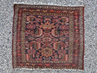 Antique Kurdish (?) Hamadan bag face. Interesting and beautiful bag face with great colors. 2'0" x 2'1" By design it appears Kurdish but has a structure similar to a Hamadan.

Cheers.   