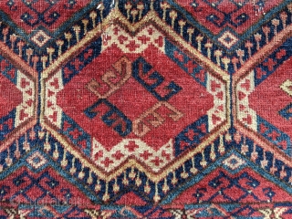 Antique Middle Amu Darya Torba. 1'1" x 3'2". Gorgeous colors with the dyrnak gul in the middle of the main guls. Missing the top border.

Cheers.        