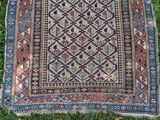 Late 19th century Shirvan prayer rug. 3'4" x 4'10". Has some old fuschine which is now grey. Beautiful colors. No holes, good pile, just the missing edges in some areas. Cheers.  