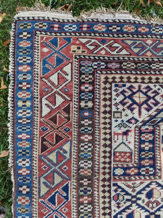 Late 19th century Shirvan prayer rug. 3'4" x 4'10". Has some old fuschine which is now grey. Beautiful colors. No holes, good pile, just the missing edges in some areas. Cheers.  