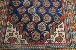 Antique Kurdish runner with boteh pattern. Such great colors and dyes! 3'7" x 16'1". Medium pile with one small wear spot in a middle and few small moth damage spots. No holes,  ...