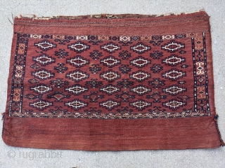 Antique Yomut flatwoven bag with original back. 2'5" x 3'10". Tight weave.                     