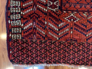 Beautiful antique Tekke ensi. 4'1" x 5'2". Original borders with minor loss to the bottom. Great colors. Some wear to the center quarter panels but mostly full pile.

Cheers.     