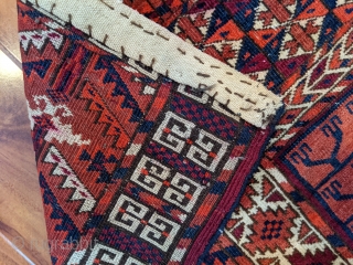 Beautiful antique Tekke ensi. 4'1" x 5'2". Original borders with minor loss to the bottom. Great colors. Some wear to the center quarter panels but mostly full pile.

Cheers.     