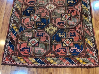 Early 1900s Uzbek / Karakalpak rug. 4'6" x 9'1". Beautiful colors and good pile. Love the multi colored selvedges. The "grey" color is actually a greyish green. 

Cheers.     