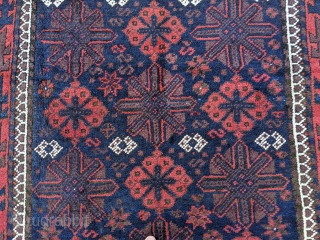 Antique snowflake Baluch rug. 3'4" x 6'5". Perfect condition as it was hung on the wall. Original goat hair selvedge and kilim ends. Soft, thick, fluffy wool.      