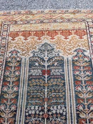 19th century NW Anatolian Bandirma prayer rug. 4'0" x 5'5". Beautiful abrash and great tealish color. It's difficult to capture the colors and wonderful apricot and yellow tones.     