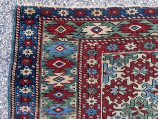 Beautiful antique Kazak rug with ample amounts of green. 3'4" x 4'5"                     