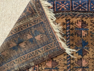 Antique Baluch camel ground prayer rug, possibly Timuri. Tight weave, soft wool with a very floppy handle. Great range of colors. Love the dark blues in this. 3'0 x 4'6".

Cheers   