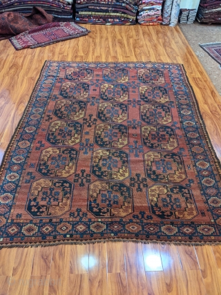 Late 19th century Ersari rug. 6'8" x 8'8". Wonderful range of colors and great border. Some scattered repairs.               