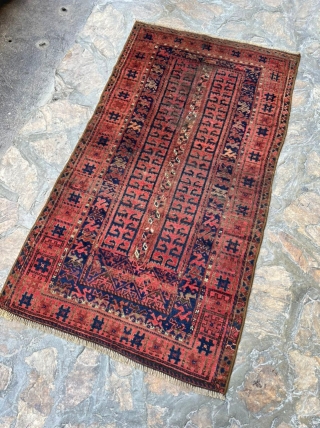 Interesting antique Baluch rug. Natural dyes. Much to enjoy about this piece.

5'2" x 2'10"                   