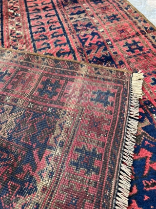 Interesting antique Baluch rug. Natural dyes. Much to enjoy about this piece.

5'2" x 2'10"                   