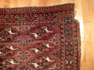 Turkmen - Yomut /  Igdyr, 9 gul chakmak motif with secondary erre  guls in between. Wonderful abrash; velvety wool; with abundant  blue-green colour in the field and border. There  ...