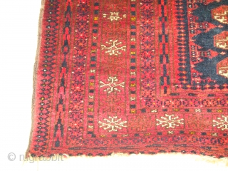 Original, Early 20thC. Afghan Turkmen "Blue" Bokhara. (It is neither of Baluch nor of Pakistani provenance.)
As described by J.K. Mumford in his book "Oriental Rugs" (Bramhall House 1981 edition): "Very rarely a  ...