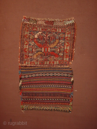 wonderful 1880 kameshe bashiri small bag, some wear as is clear, no repairs, great superbe natural colors, and orgeous kelim back(piece of art in itself)

40x67cm
1.3x2.2ft
        