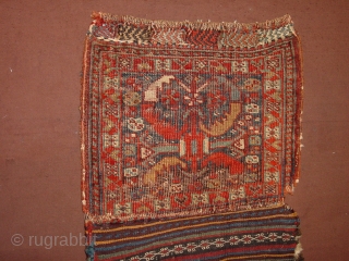 wonderful 1880 kameshe bashiri small bag, some wear as is clear, no repairs, great superbe natural colors, and orgeous kelim back(piece of art in itself)

40x67cm
1.3x2.2ft
        