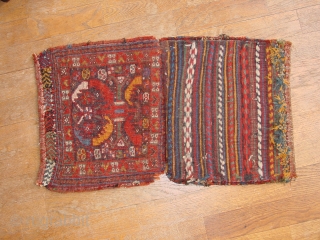wonderful 1880 kameshe bashiri small bag, some wear as is clear, no repairs, great superbe natural colors, and orgeous kelim back(piece of art in itself)

40x67cm
1.3x2.2ft
        