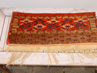 wonderfyl 19th century, small turkoman artefact, in great condition, only a tiny left lower corner repair, great natural colors

66x25cm  2.2x0.8ft without kelimpart and fringes        