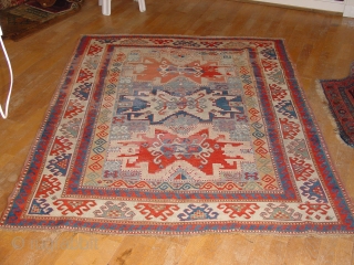 very old kazak, ca 1850, great size 166x212cm  5.5x7.1ft, all ends, beautifully secured, impressive design, great natural colors, the wool used for repiling is faded, 
the rug is clean and ready  ...