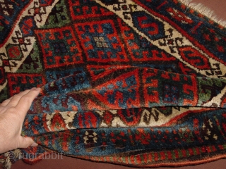 wonderful antique jaff kurdish bagface, very meaty  original pile, in superbe condition, no repairs, fabulous natural colors, and a great pattern!
jaff collectors must have... the blackfabric is loosely stitched, to make  ...