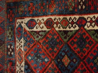 wonderful antique jaff kurdish bagface, very meaty  original pile, in superbe condition, no repairs, fabulous natural colors, and a great pattern!
jaff collectors must have... the blackfabric is loosely stitched, to make  ...
