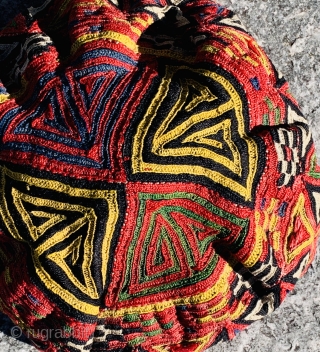 	A fully embroidered hat from Central Asia. They are composed of silk embroidery on cotton and linen..                