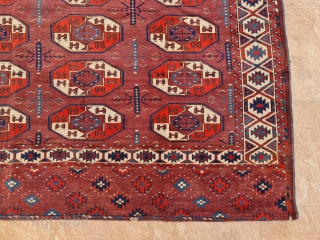 Ex-Azadi Yomud group main carpet. Early 19th century. Size is 265 x 163. Some consistent with age wear and repairs in the field as shown. With original Azadi label on backside (picture  ...
