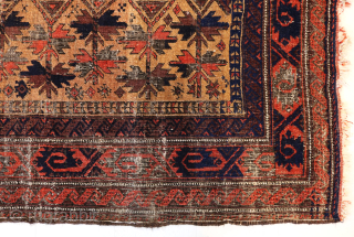 Ca. 1900 Baluch Prayer Rug. 180 x 99 cm. The dark blue and orange colours stand out amongst the warm yellow field with wear over the years that makes this rug more  ...