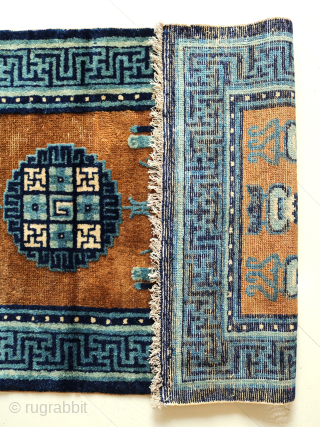 Chinese Peking Rug
Circa 1900
135 x 66 cm 

A collectable antique Chinesse Rug from the Peking era, with traditional colours, the field in a warm gold tone with contrasting dark blue borders, highly  ...