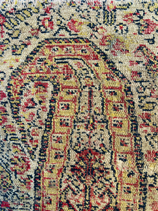 "Antique Kurdish senneh Sample (wagireh), early 18th Century, featuring two golden boteh motifs. This piece was used as a trial or reference for larger rug production, typically woven with the same materials  ...