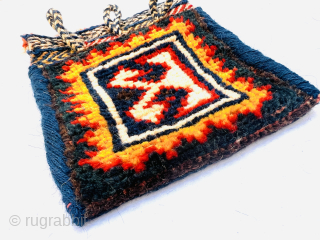 Miniature Lori Qashqai Gabbeh bag circa 1900 wool on wool size 18x20cm,Please Contact this email for more information.
hamidparsacarpet@yahoo.com               