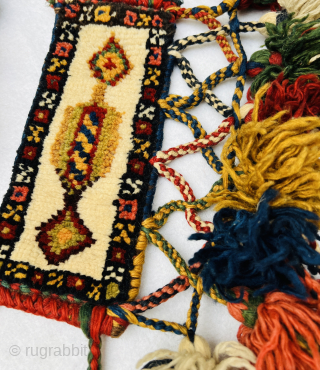 Rare Antique Qashqai Knee Bands | Circa 1880

This exceptional pair of antique Qashqai knee bands, dating back to around 1880, is a rare find. The bands retain their original braided cords and  ...