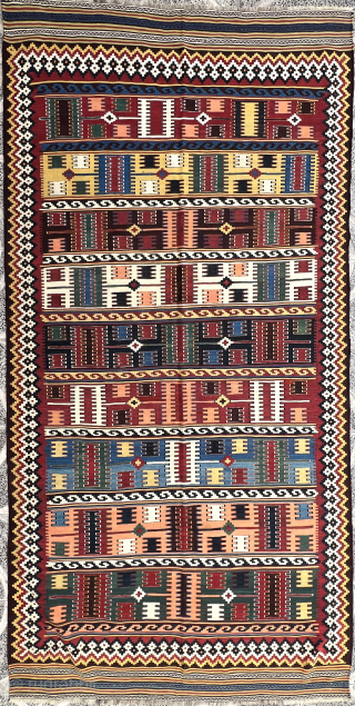 Exceptionally fine Qashqai kilim, woven with a geometric design and featuring a rare harmony of three yellows — golden, lemon, and apricot — alongside richly saturated vegetal dyes in shades of red,  ...