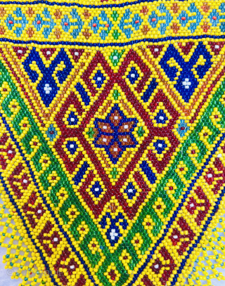 Antique  Baluch glass beaded triangle with caravan design.  Please Contact this email for more information. hamidparsacarpet@yahoo.com               