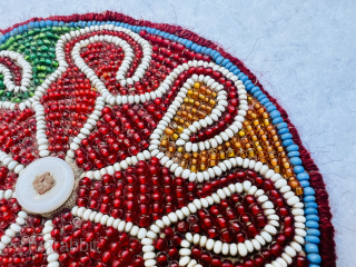 Antique north Afghanistan glass beaded  beads on cotton with Shell button In the center. Diameter 14cm Please Contact this email for more information.
hamidparsacarpet@yahoo.com         