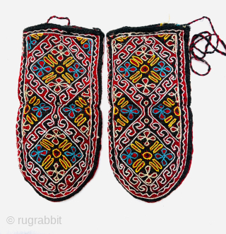 A pair of beautiful antique Persian woolen knitted socks from the Azerbaijan region with silk embroidery. Please Contact this email for more information.
hamidparsacarpet@yahoo.com          