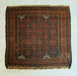 Baluch Masnad (sitting rug) circa 1880, featuring gorgeous shades of blue, white, red, and natural brown wool, oxidized in some areas. Beautiful flatwoven ends (weft floating technique), all wool. One very small  ...
