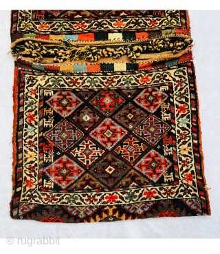 Magnificent Varamin Khoorjin circa 1880 With very beautiful animals woven on both sides and looking towards the center., the field is covered in a diamond lattice containing cruciform designs with natural saturated  ...