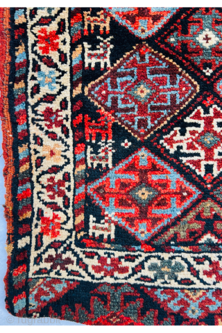 Magnificent Varamin Khoorjin circa 1880 With very beautiful animals woven on both sides and looking towards the center., the field is covered in a diamond lattice containing cruciform designs with natural saturated  ...