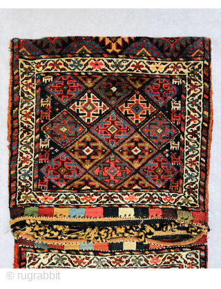 Magnificent Varamin Khoorjin circa 1880 With very beautiful animals woven on both sides and looking towards the center., the field is covered in a diamond lattice containing cruciform designs with natural saturated  ...