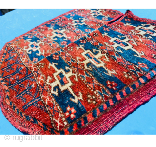 Second of the 19th.c Yumod Turkmen Saddle Cover,Nice strong natural colors and wonderful mid-blue Asymmetric textured open on left,42x43cm perfect condition
Please Contact this email for more information. 
hamidparsacarpet@yahoo.com     