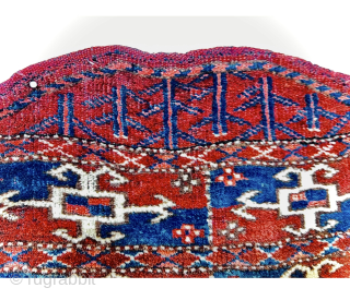 Second of the 19th.c Yumod Turkmen Saddle Cover,Nice strong natural colors and wonderful mid-blue Asymmetric textured open on left,42x43cm perfect condition
Please Contact this email for more information. 
hamidparsacarpet@yahoo.com     
