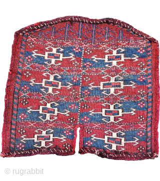 Second of the 19th.c Yumod Turkmen Saddle Cover,Nice strong natural colors and wonderful mid-blue Asymmetric textured open on left,42x43cm perfect condition
Please Contact this email for more information. 
hamidparsacarpet@yahoo.com     