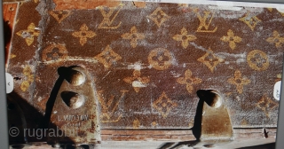Authentic LOUIS VUITTON Monogram Steamer Trunk.  Manufactured in France over a hundred years ago. Instantly recognized by the famous monogram adorning all sides. Brass hardware and wheels, canvas, and leather trim.  ...