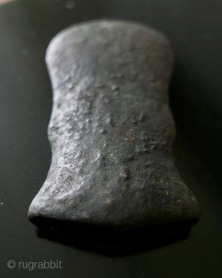 Bronze Age Burmese Battle Axe Head;  approx 3000 years old;  acquired in Rangoon last century;   3 3/4"H x 2"W

No longer available        