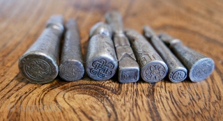 Antique Tibetan document stamps;  metal;  19th c;  2" to 1 1/2"H.  Acquired in Dharamsala,  N India some years ago.         