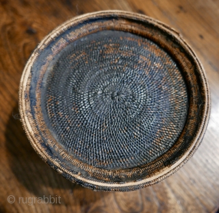 Antique Burmese lacquered wicker basket with an inner shelf;  18th- 19th c;  very fine and tight weave; very good condition for its age but a tiny break in the foot  ...