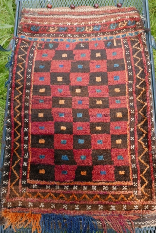Complete Baluch 'Pushti' with incredible graphics, and plush glistening wool;  circa 1920;  2'x3'/60cm x 90cm;  some moth damage at the very edge  but none where the beauty lies;  ...